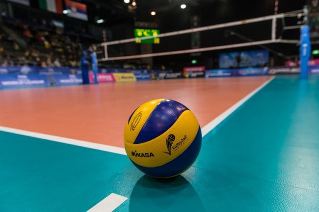 volleyball on the edge of a volleyball court