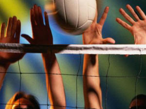 blocking of a volleyball at the net